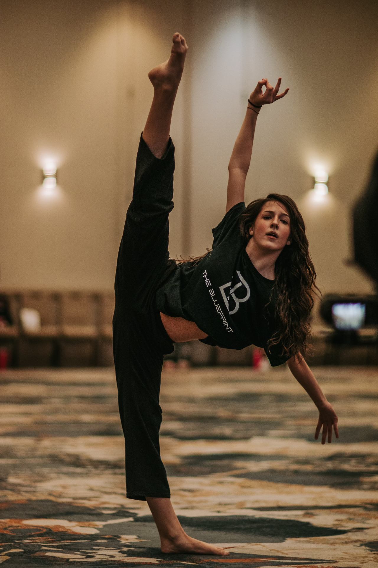 Blueprint dancer extending in class